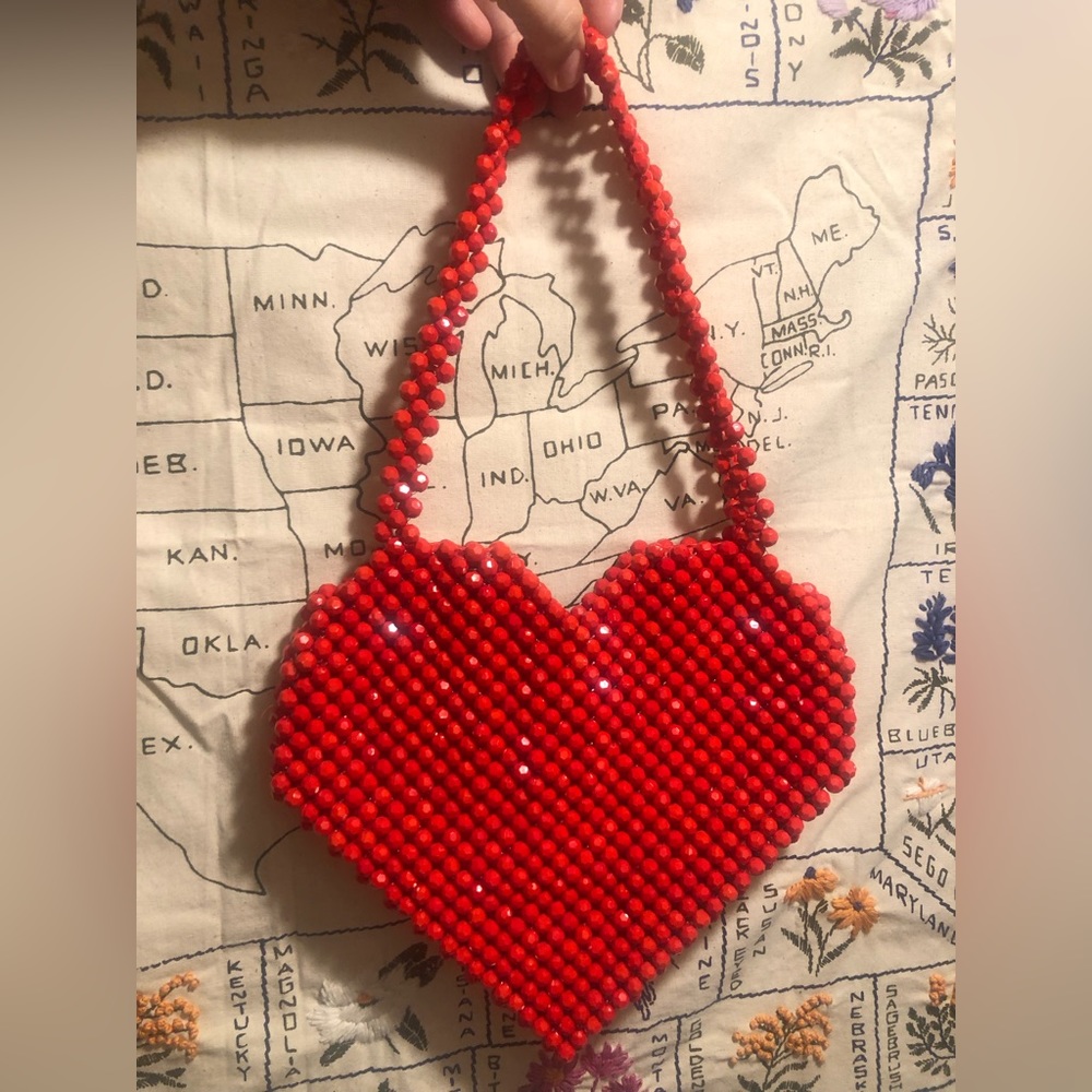 Red heart-shaped beaded handbag